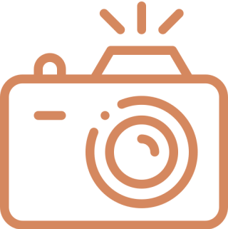 Icon of a camera with a flash symbol.